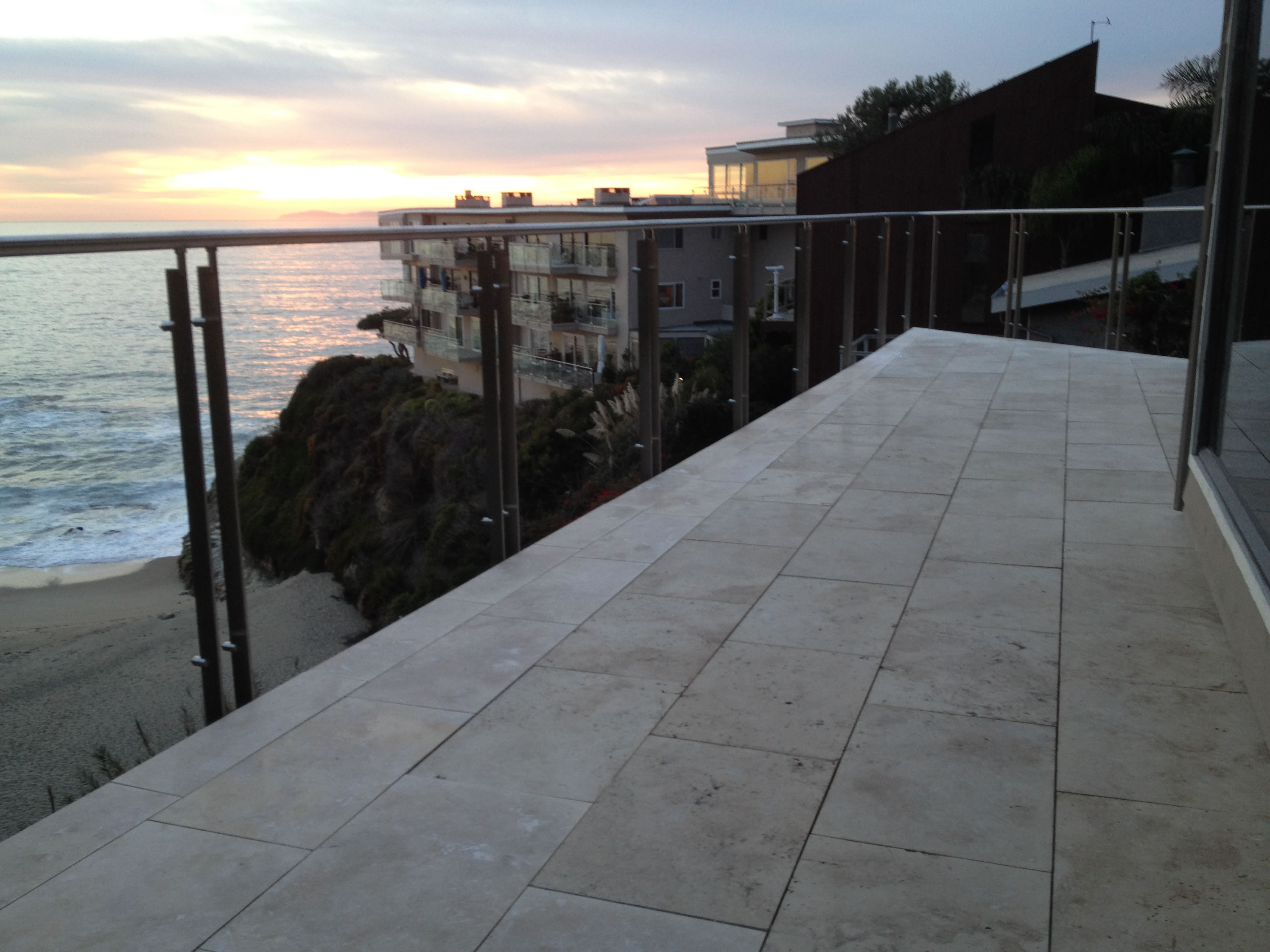 deck coatings in twilight as sun goes down on Pacific Ocean