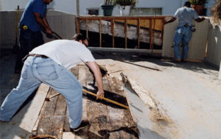 deck carpentry job removing dry rot decking