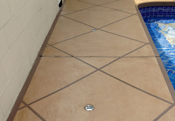 no slip walkway coating next to a swimming pool