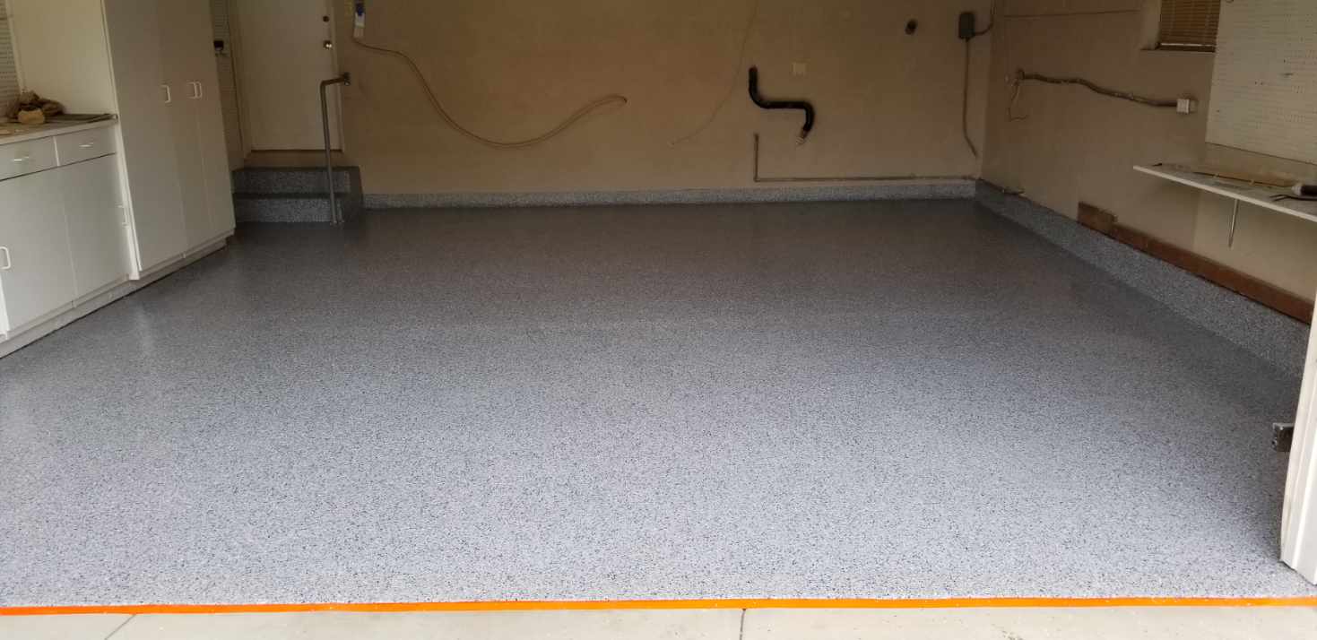 after epoxy garage floors coating is applied showing smooth surface