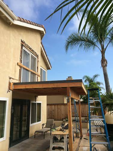 Orange County deck contractor adds small second story balcony to house