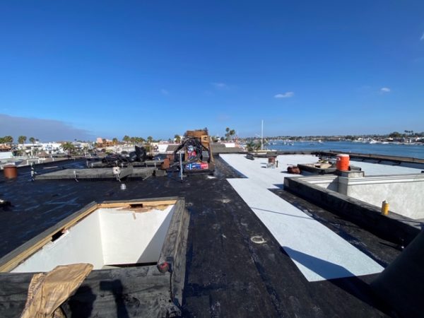 Flat roof repair and coating application