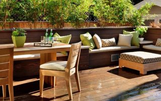 Deck contractor after small deck for dining outside with banquette and chairs