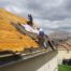 men completing roof repair in orange county