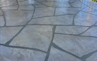 deck waterproofing after Desert Crete is applied to look like flagstones