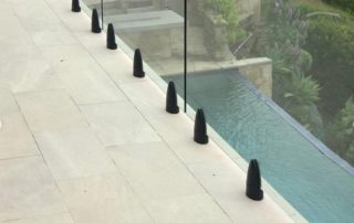 After Deck contractor adds clear railings to home