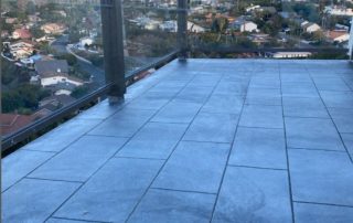 after Deck contractor Adds Clear Railings to Laguna Beach Deck